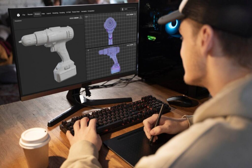 A man using a digital tablet to design a 3D model of a drill on a computer screen.