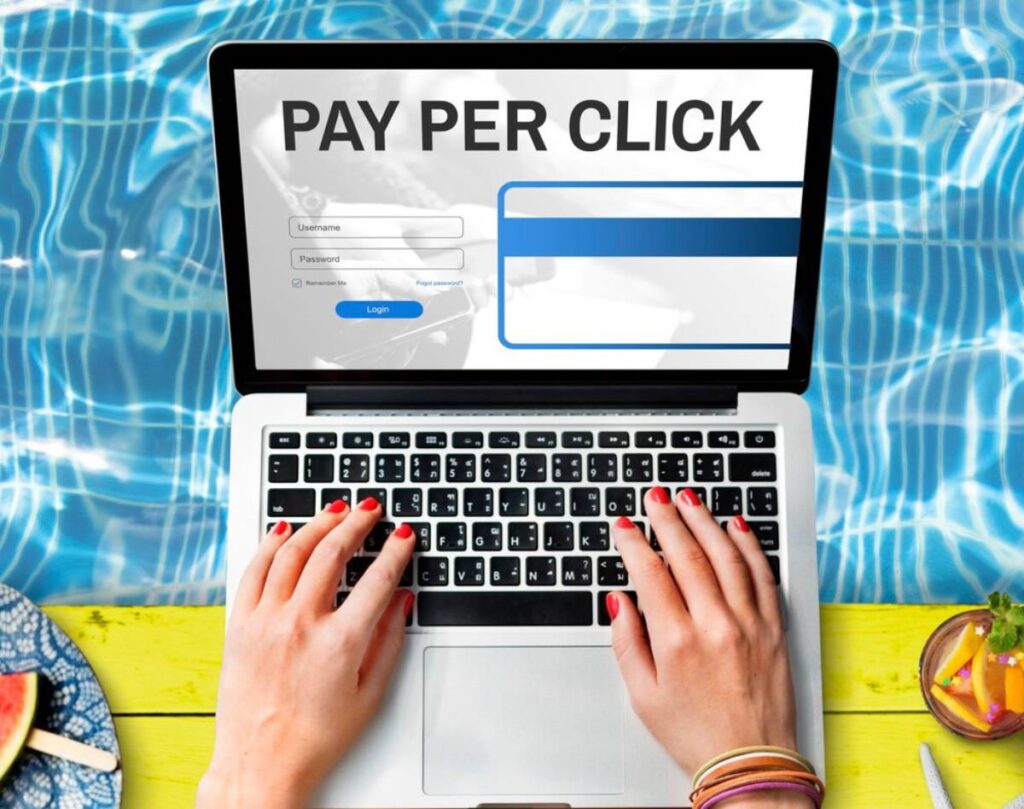 Person using a laptop with "Pay Per Click" login screen, positioned over a pool-themed background.