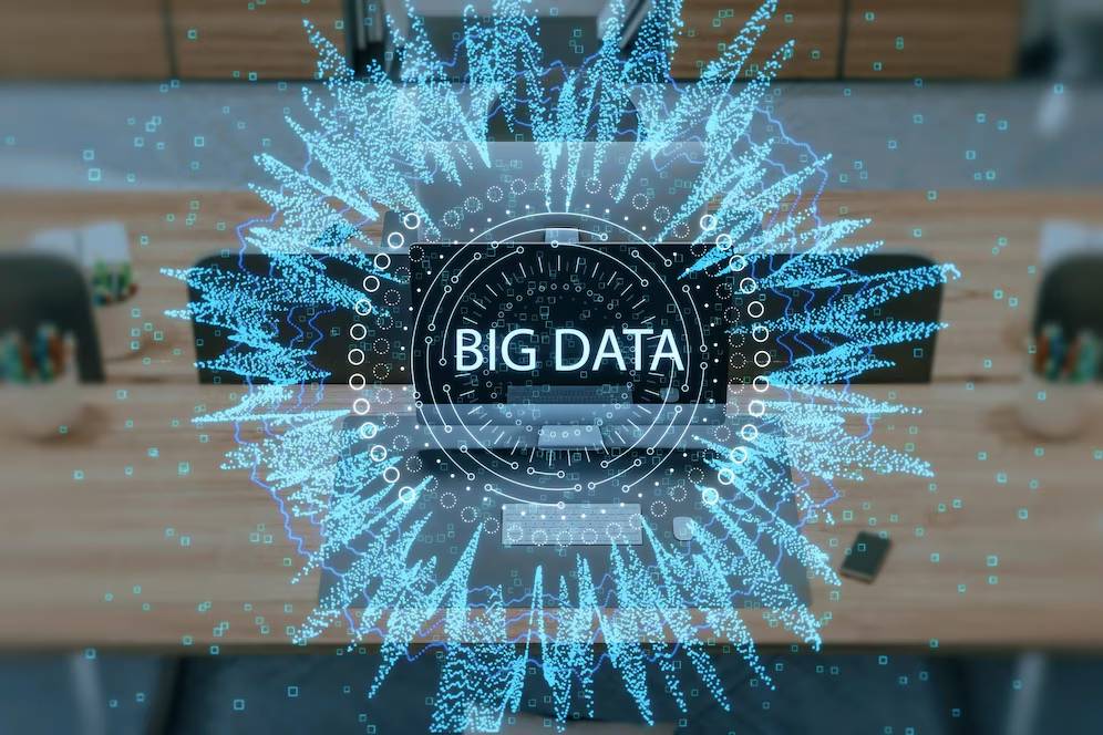 Digital graphic depicting BIG DATA surrounded by dynamic blue particle streams, symbolizing data flows and analytics technology.
