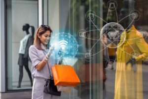 A woman interacts with a futuristic digital display while shopping, surrounded by various technology icons.